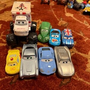 Colorful Toy Car Collection with Yellow, Green, Blue, and Silver Vehicles